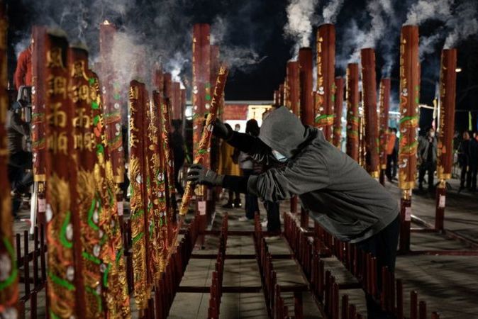 Лунный Новый год-2022 в фотографиях: как в мире отметили наступление года Тигра